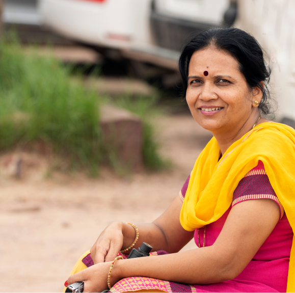 portrait-of-indian-woman-against-view-of-jodhpur